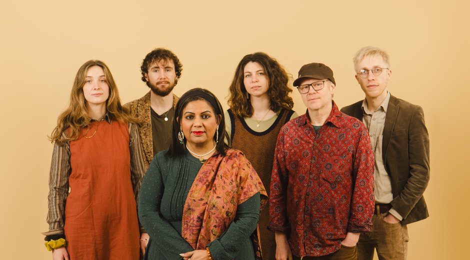 mishra and deepa standing by Benji Wilson